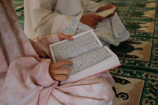 Group of kids learning to read Al-Quran