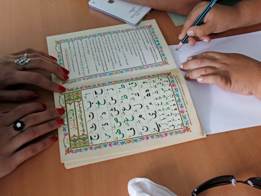 A woman practicing learning the Arabic languages