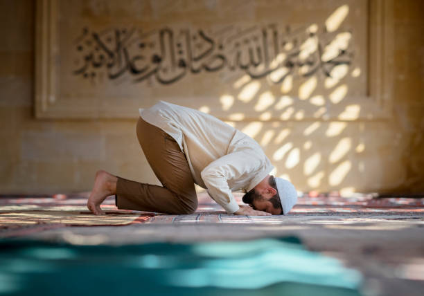 Muslim man praying Asr in mosque