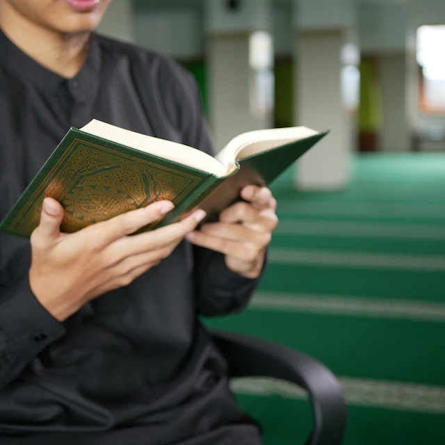  A Muslim recites Quran after Asr Prayer