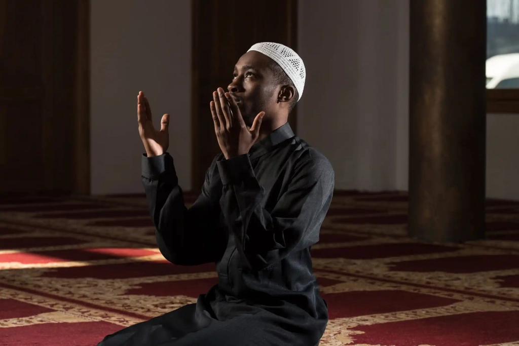 African-American Muslim man praying Salatul Asr