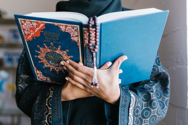 A woman teaches herself to read Quran