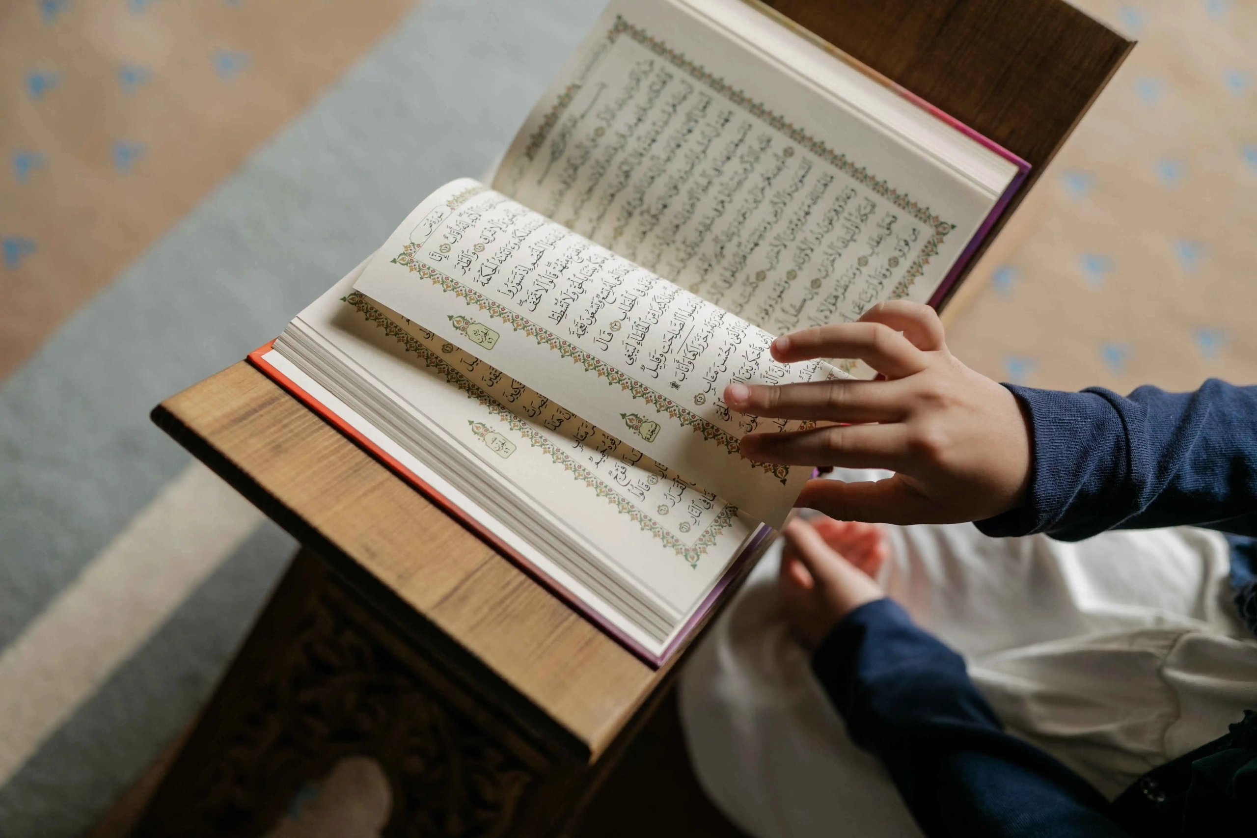 A young Muslim woman reciting the Quran