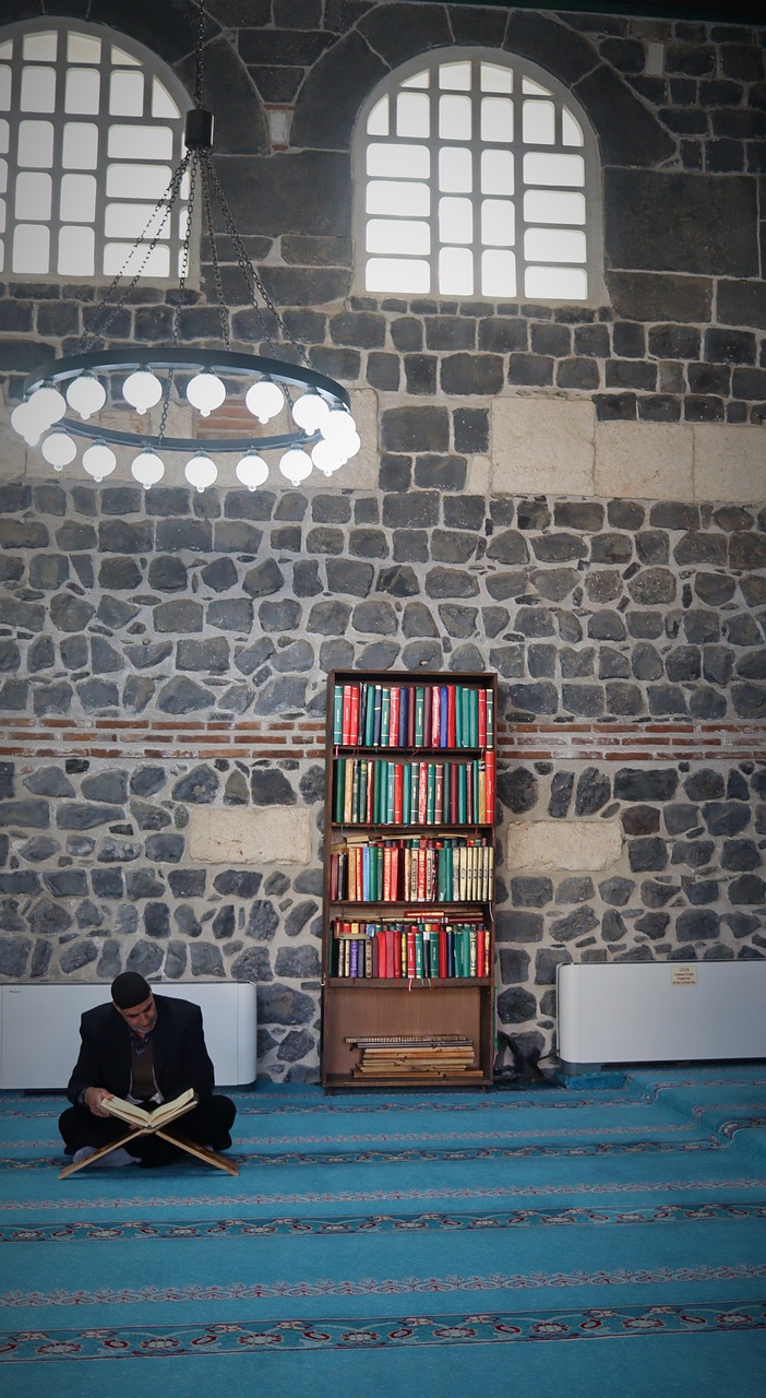 A Muslim man memorizing the Holy Quran after Asr Prayer