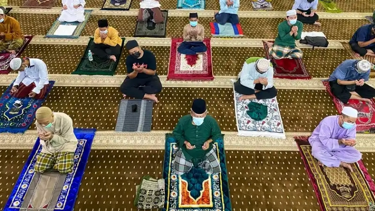 Muslims perform Taraweeh prayer during Ramadan