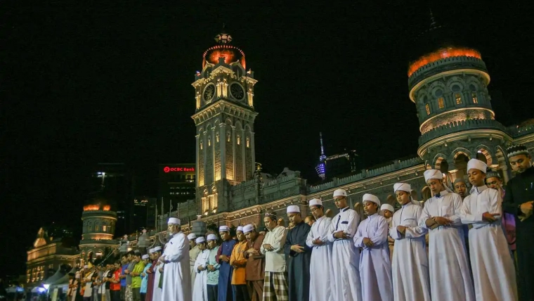 Muslims perform the Taraweeh prayer during Ramadan